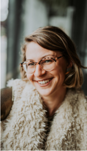 A photo of a caucasian-appearing woman with blonde hair and glasses smiling. She is Hannah Silver, the instructor for the event. 